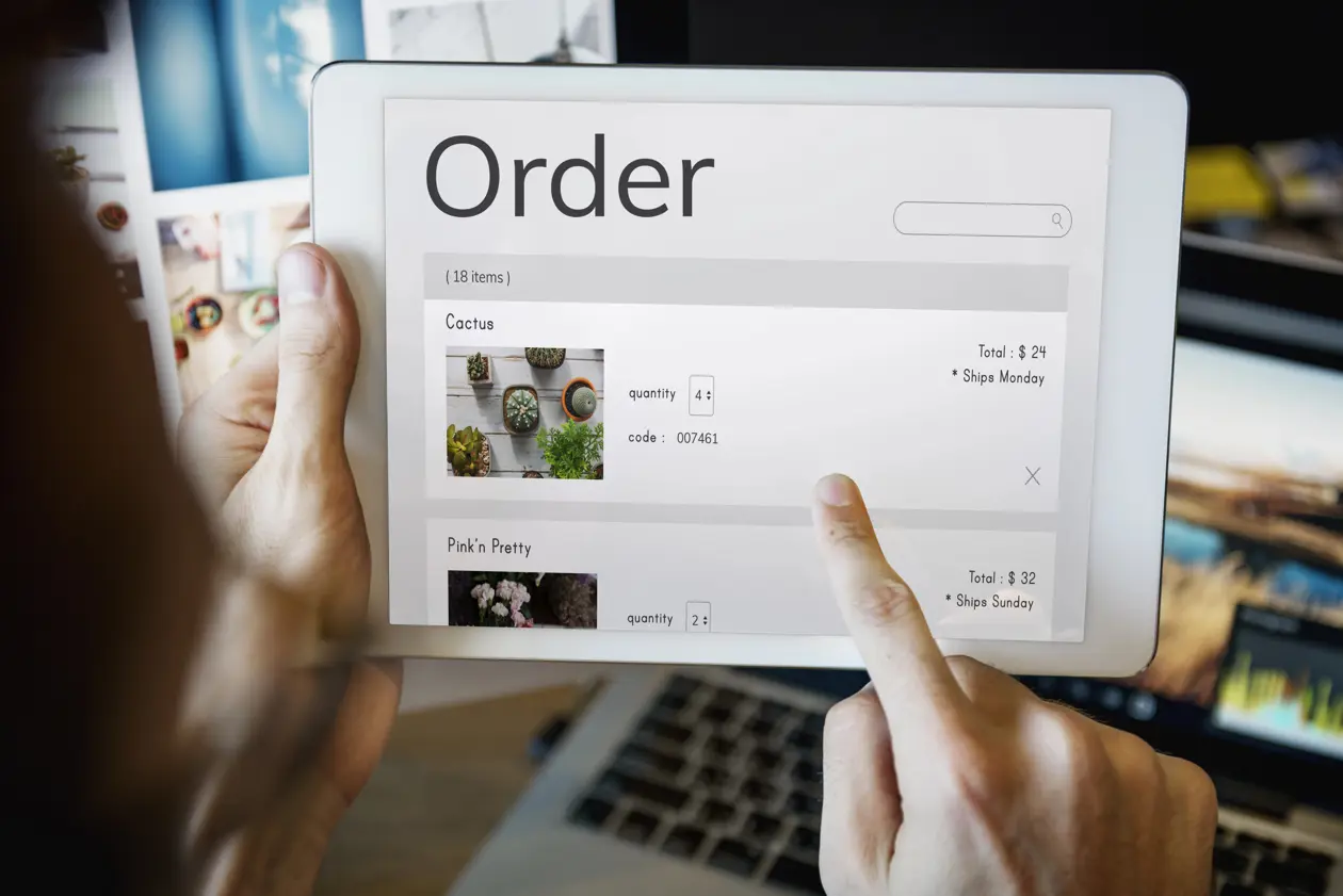 a person holding a tablet