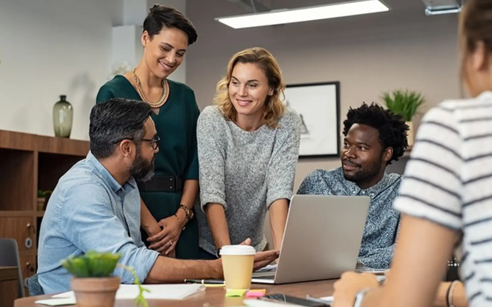 a group of people around a table