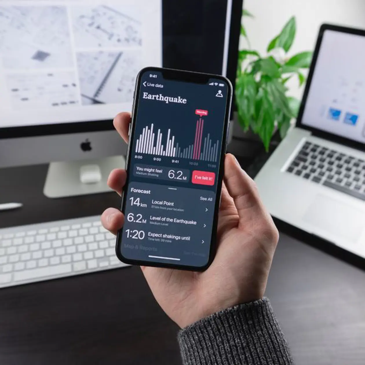 a person holding a phone with a screen on it