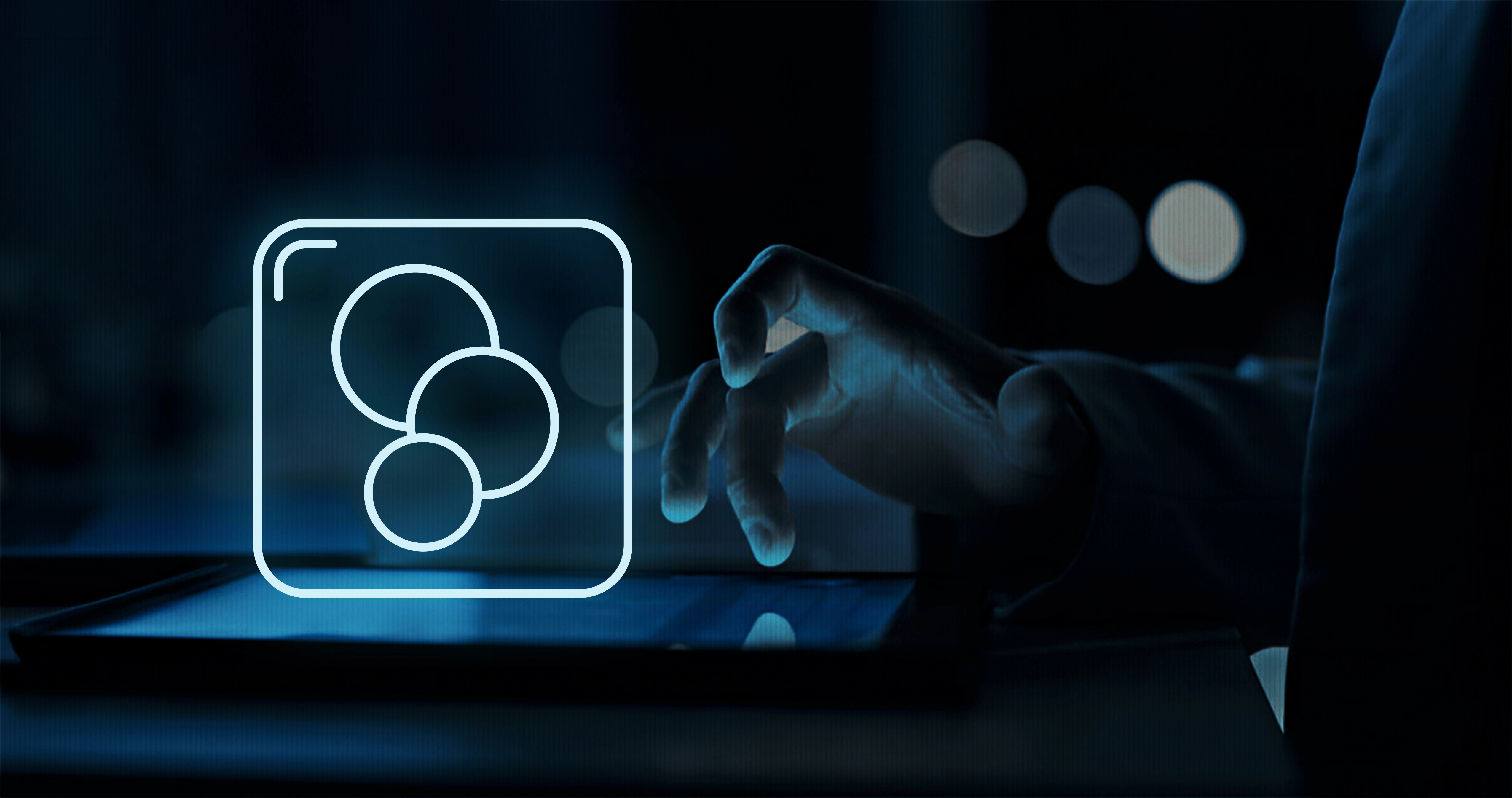 a hand touching a tablet with a glowing sharepoint logo