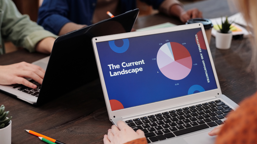 person using laptop with data displayed