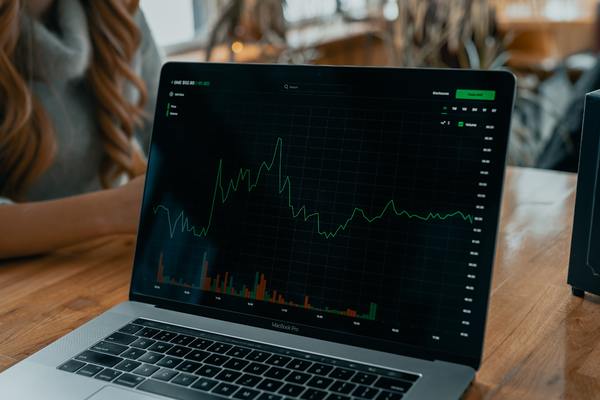 a laptop with a graph on it