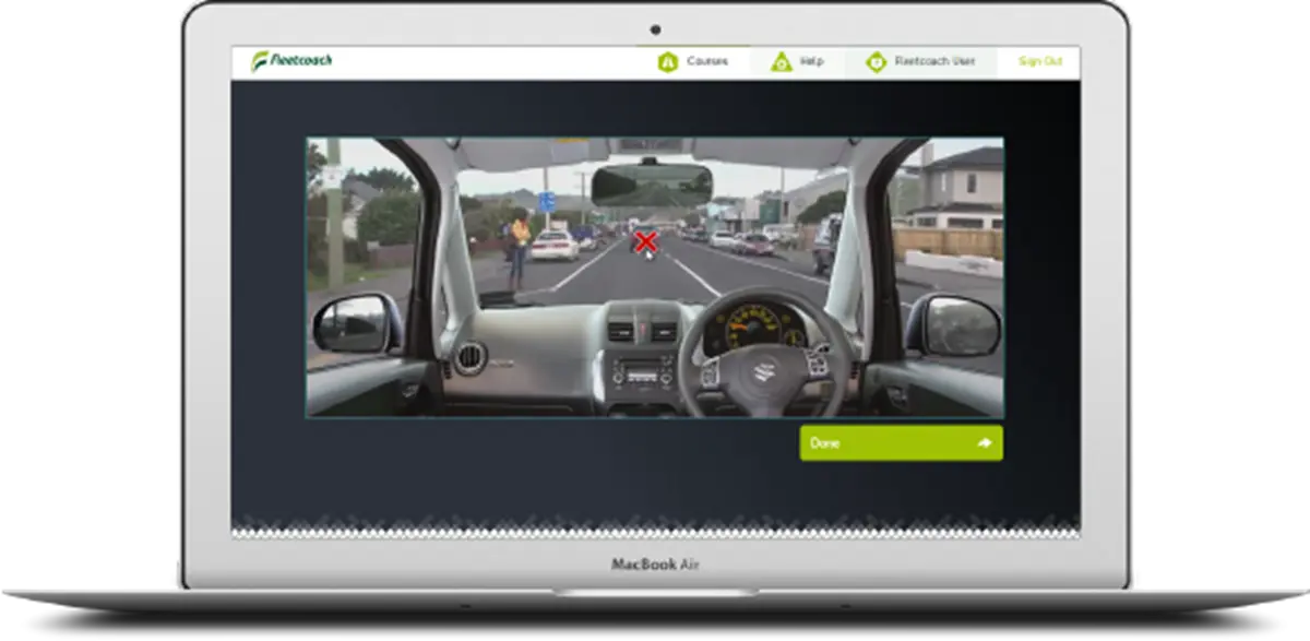a screenshot of a car driving down a road