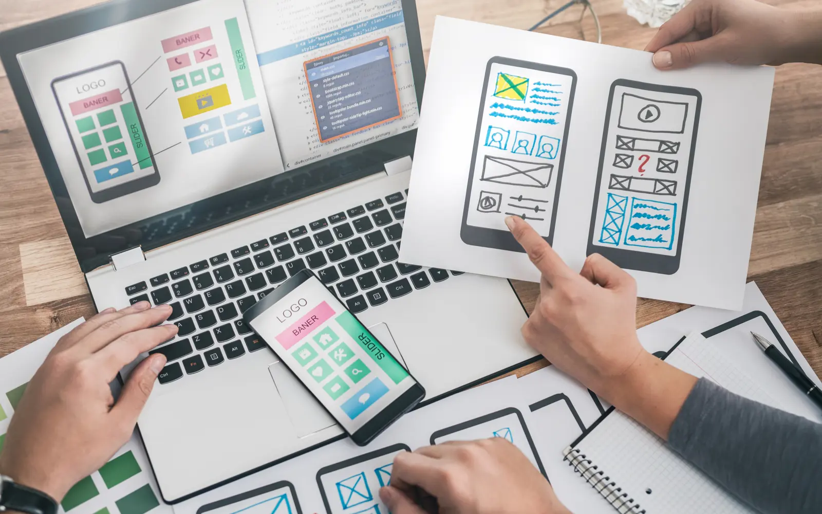 a group of people looking at a computer screen