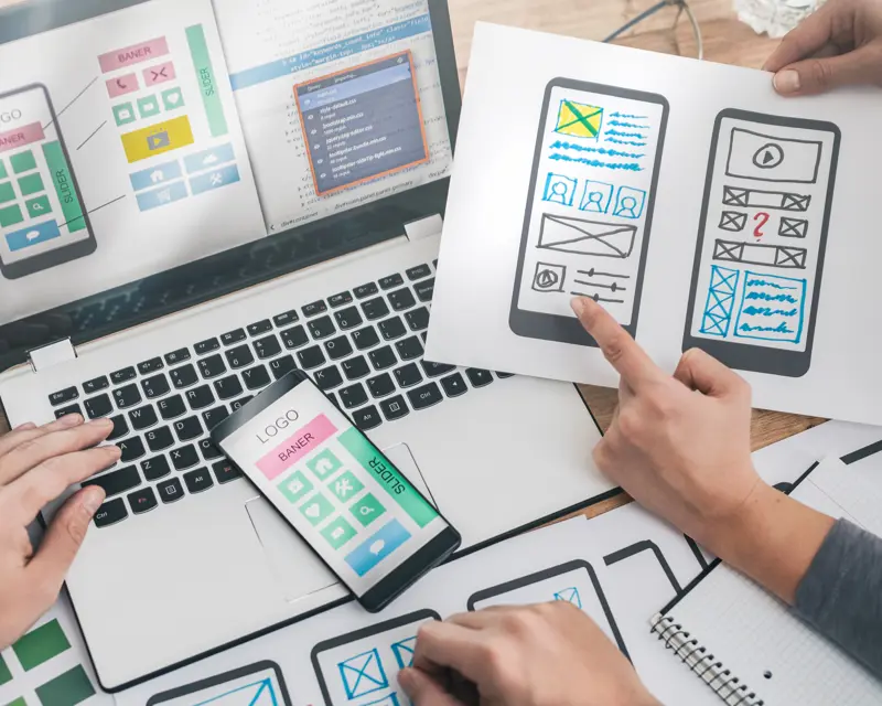 a group of people looking at a computer screen