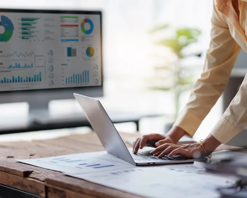 a person typing on a laptop