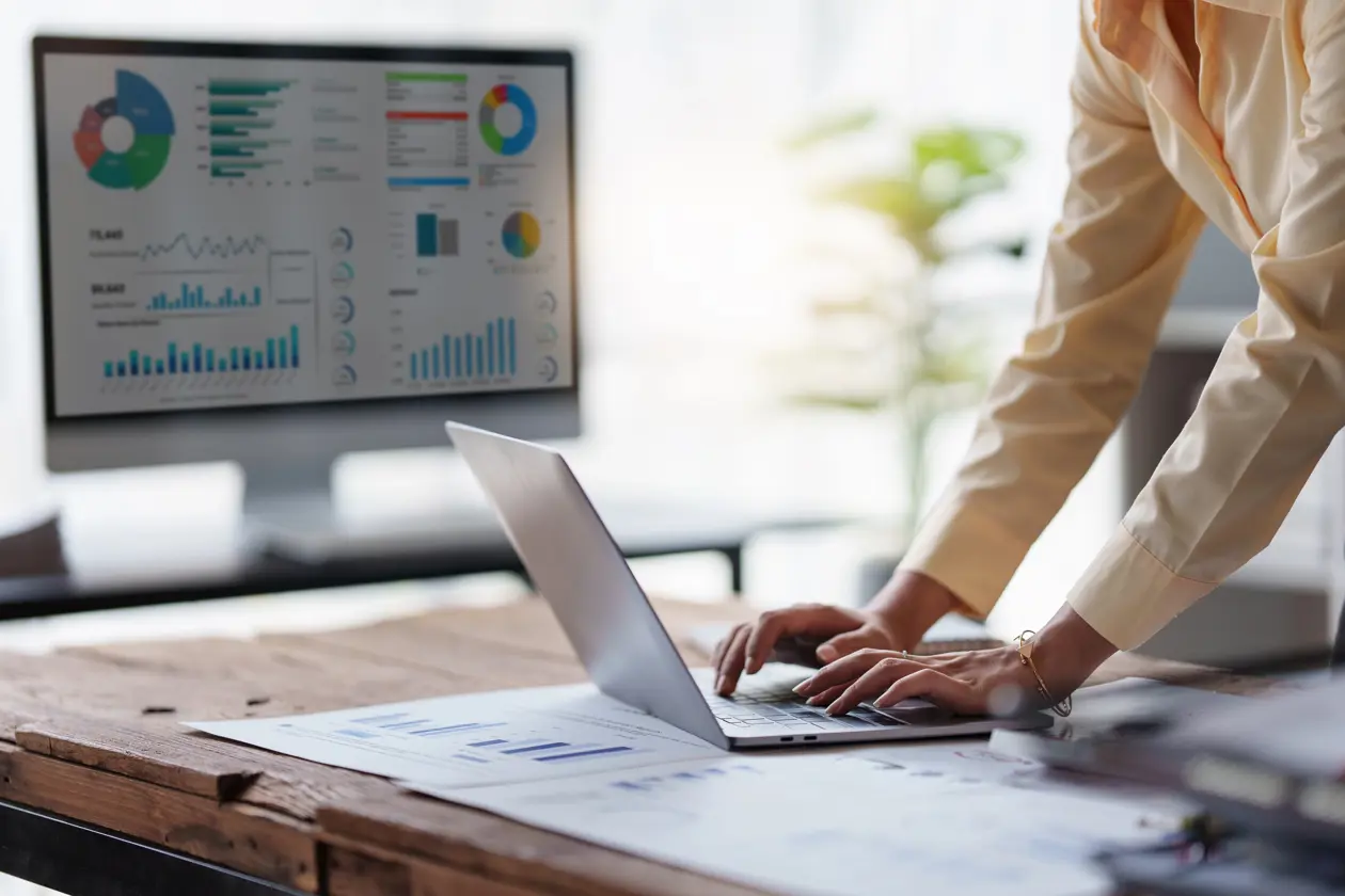 a person typing on a laptop