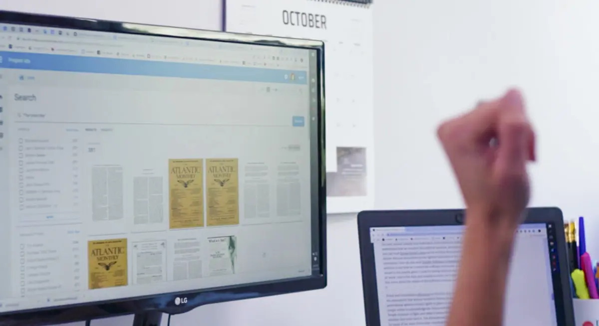 a person looking at a computer screen