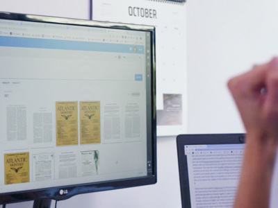 a person looking at a computer screen