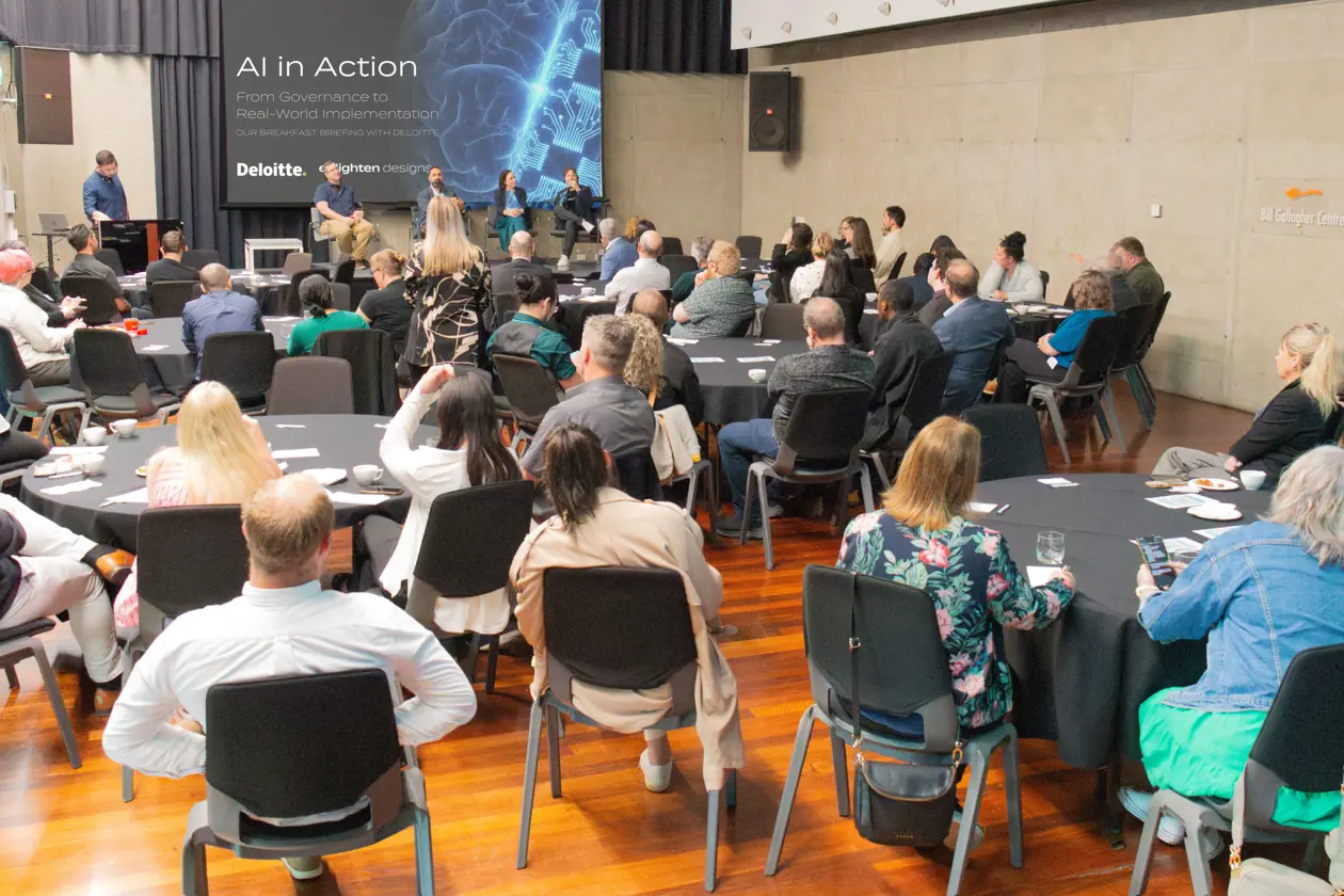 a group of people sitting in a room