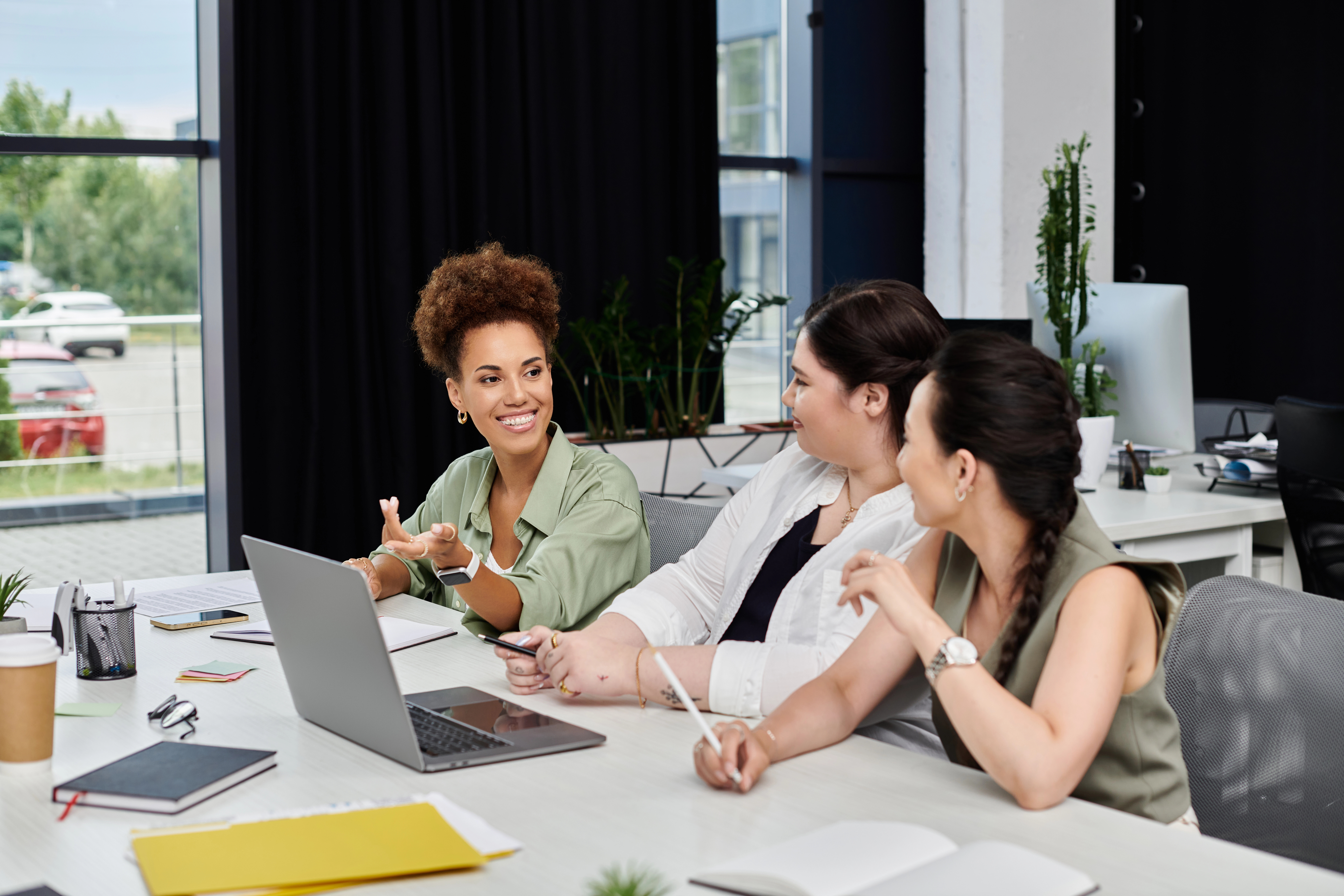 Team collaborating with a laptop
