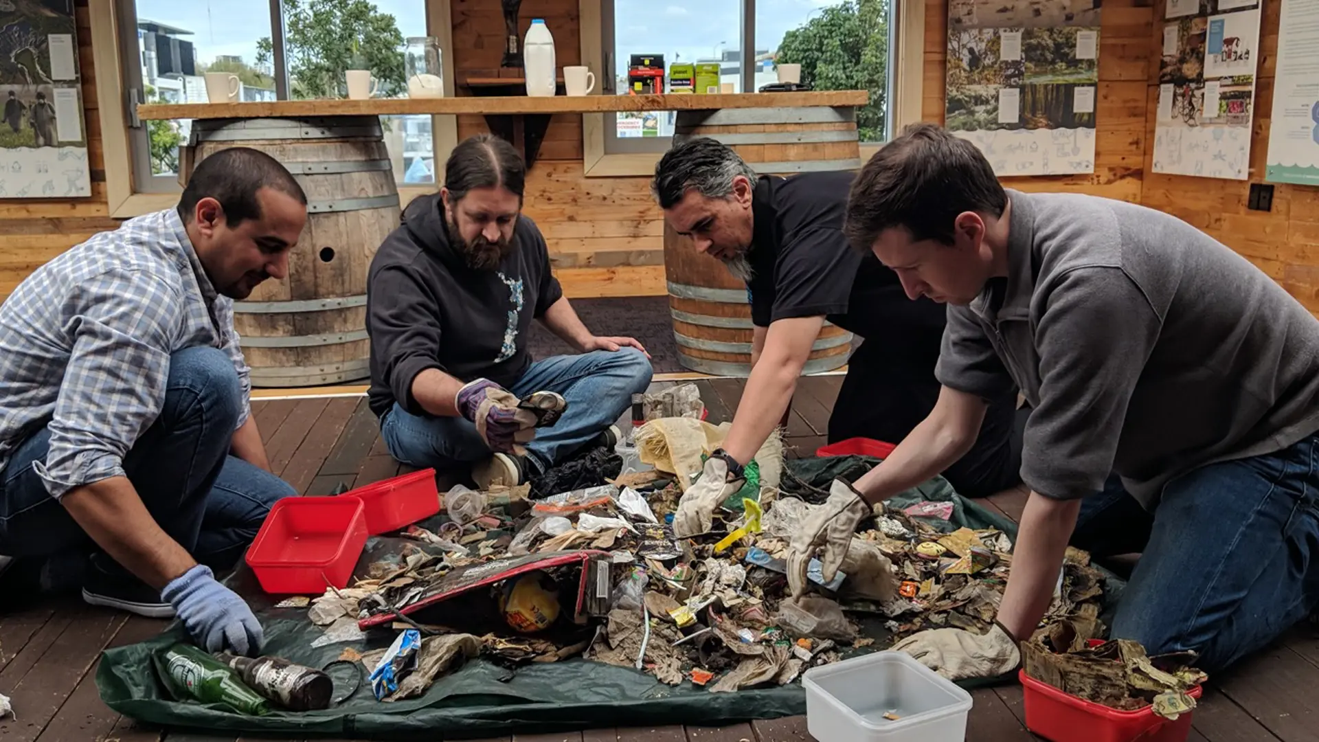 a group of men cleaning up trash