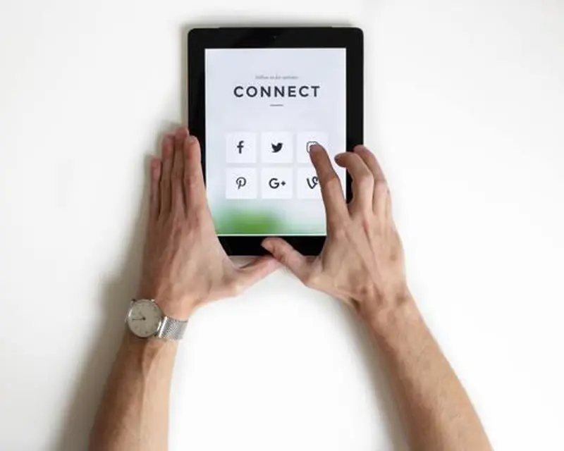 a person holding a tablet