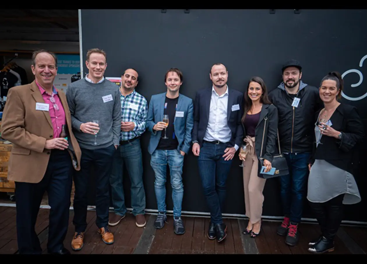 a group of people posing for a photo